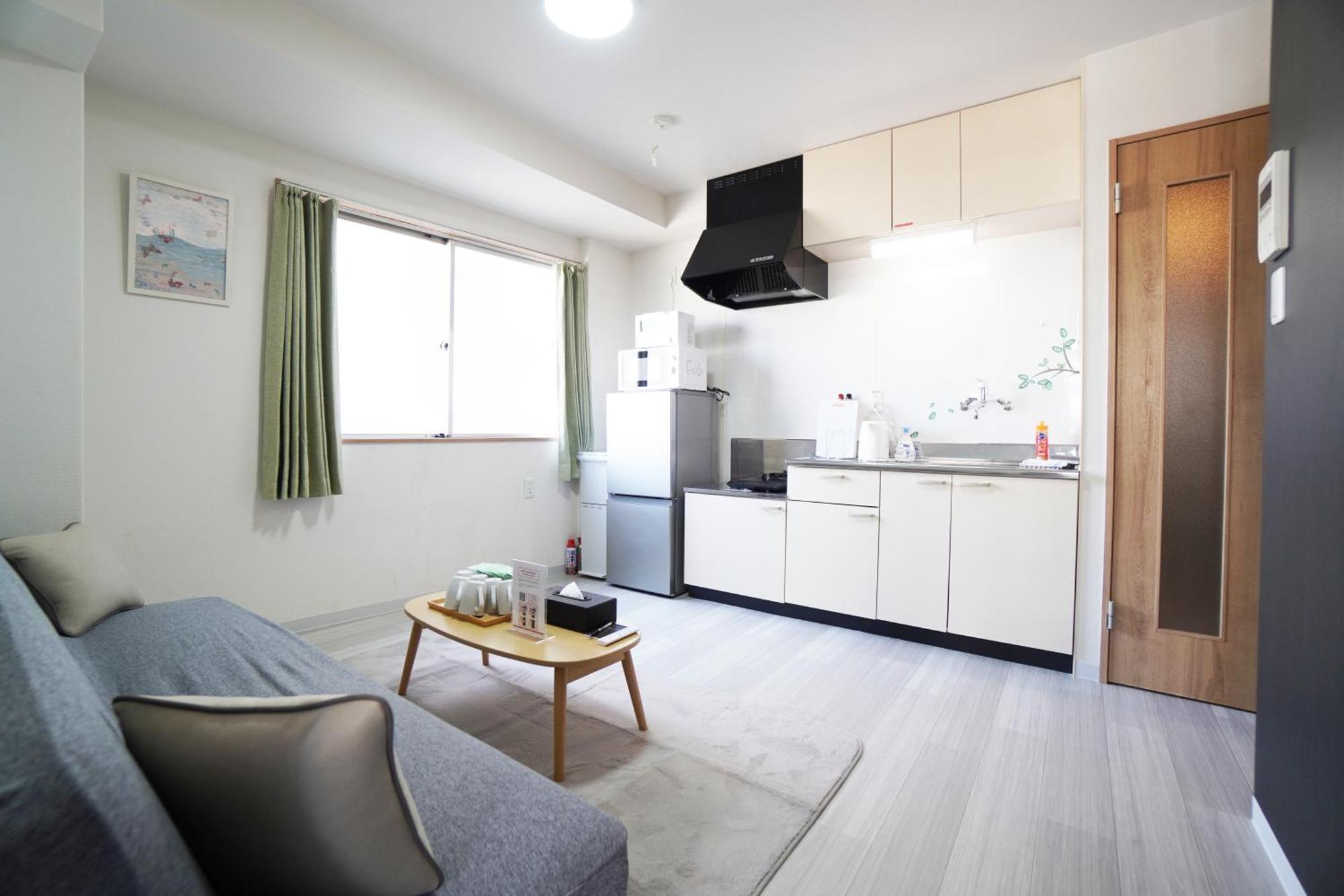 Ferienwohnung Akimi Building Ōsaka Exterior foto