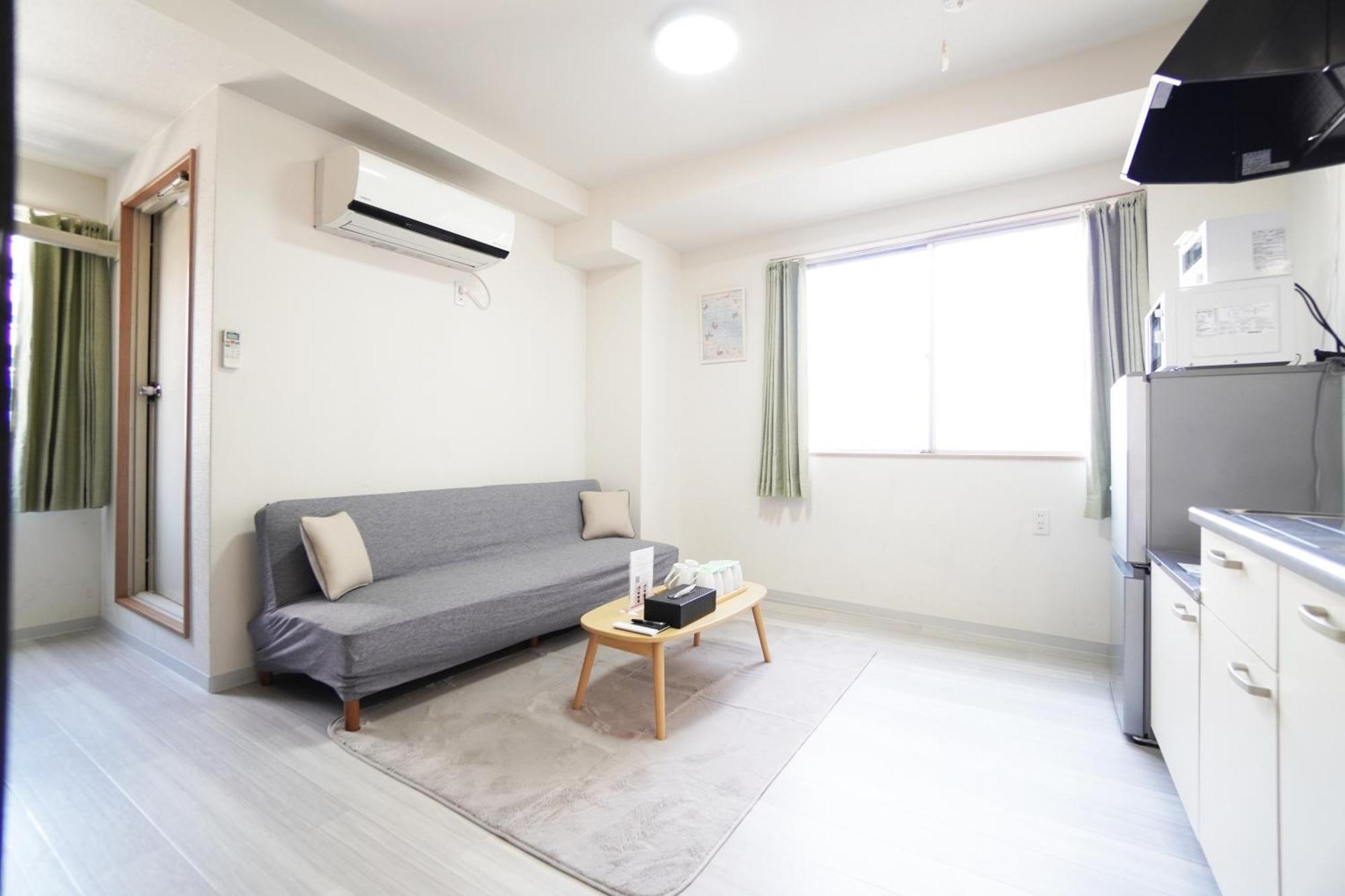 Ferienwohnung Akimi Building Ōsaka Exterior foto