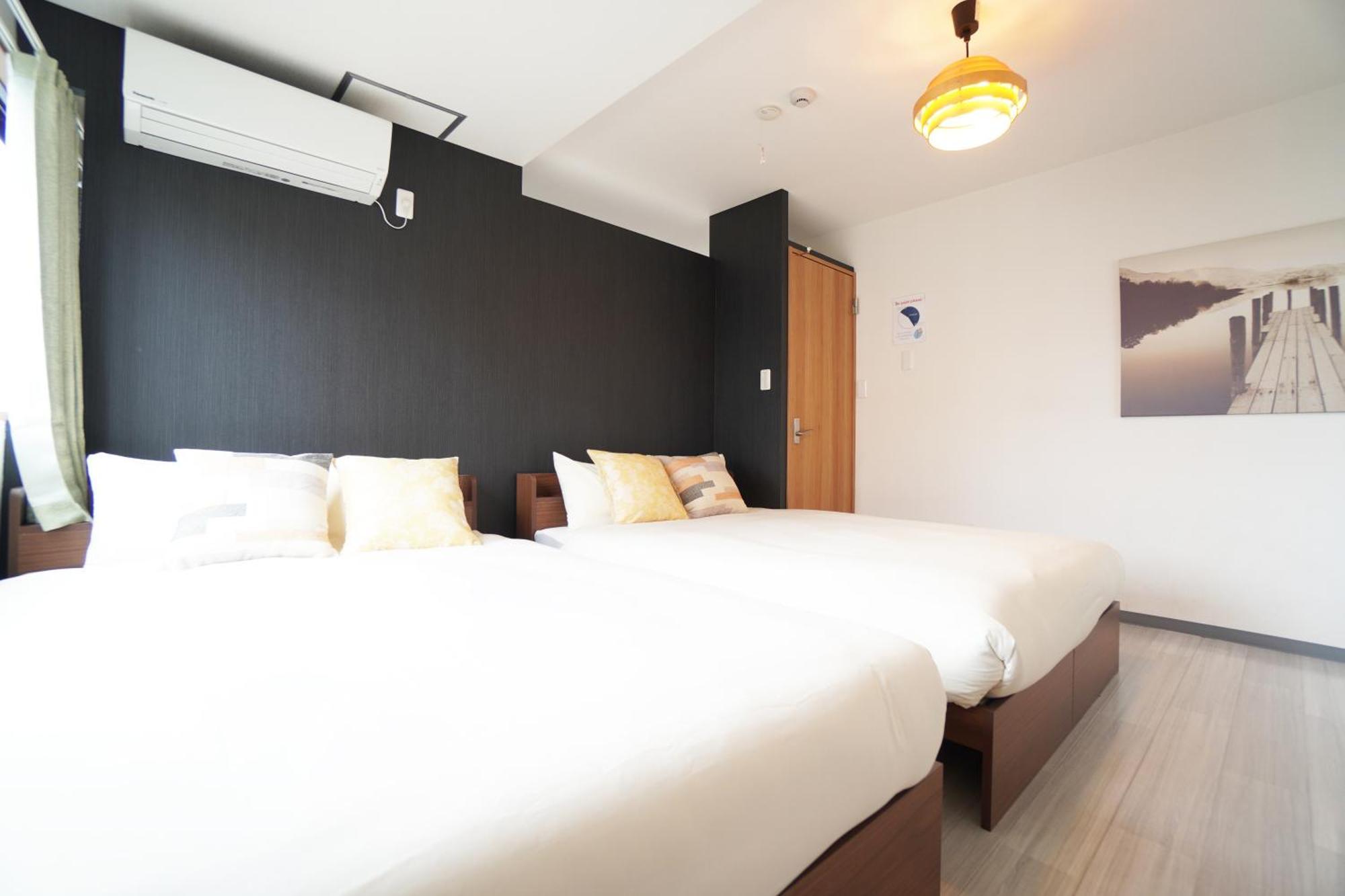 Ferienwohnung Akimi Building Ōsaka Exterior foto
