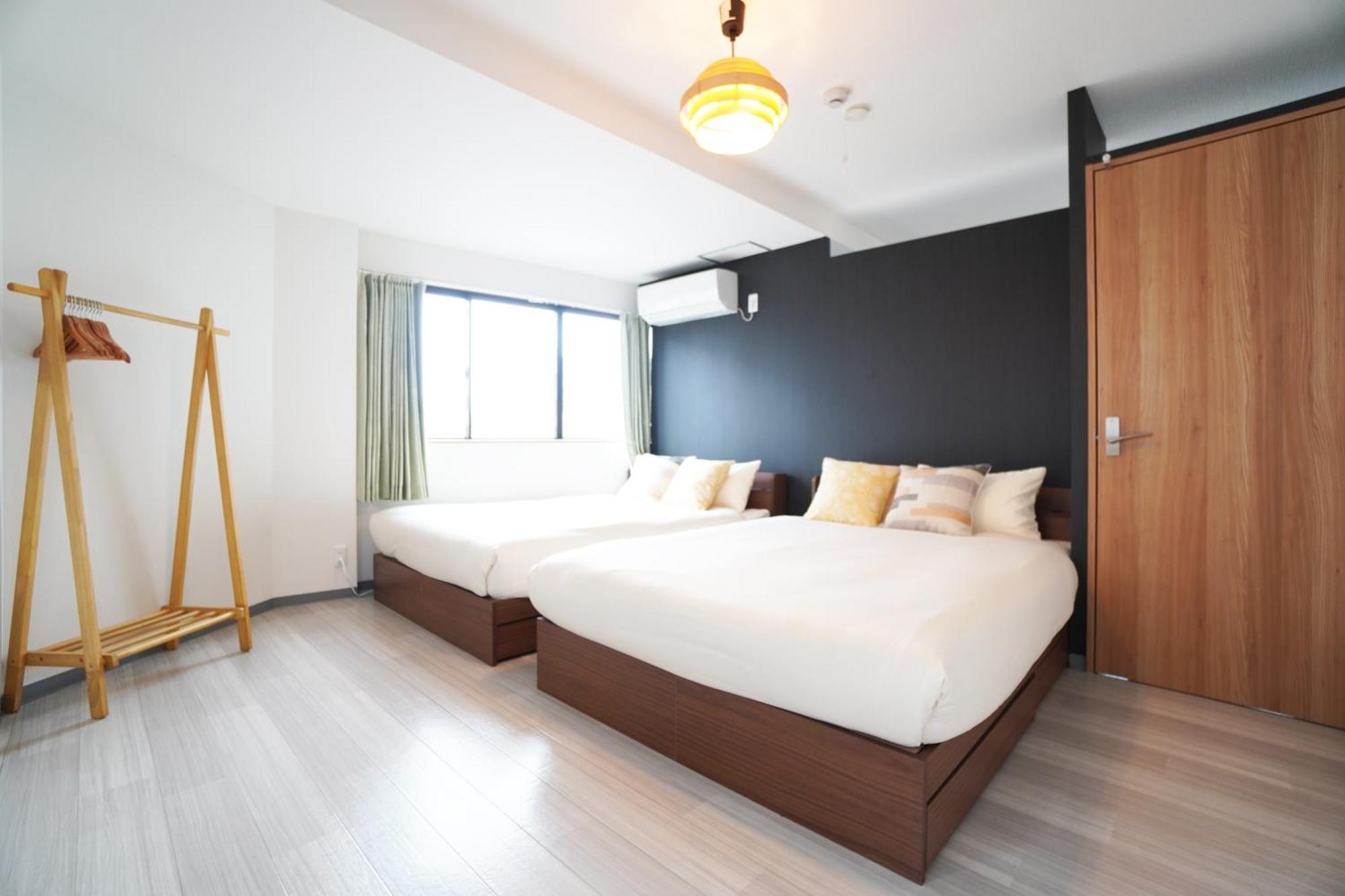 Ferienwohnung Akimi Building Ōsaka Exterior foto
