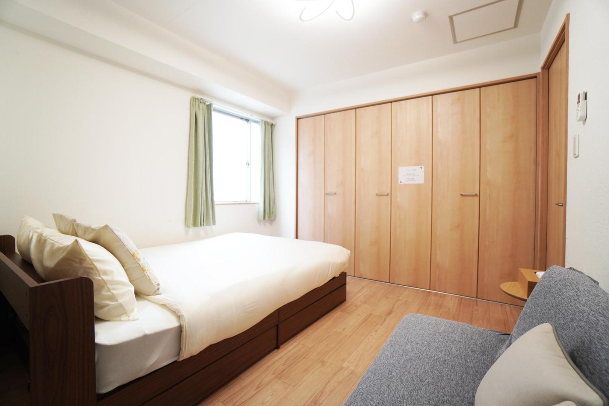 Ferienwohnung Akimi Building Ōsaka Exterior foto
